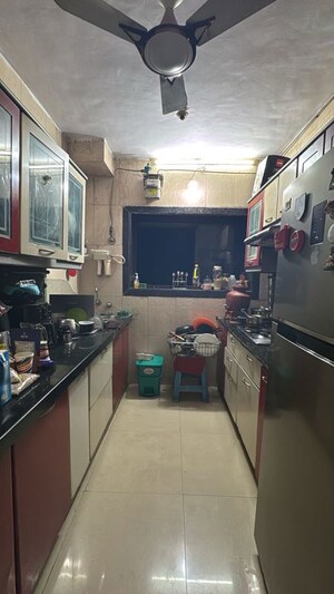 Kitchen in 2 BHK Apartment at Gokuldham Complex, Goregaon East – for Sale