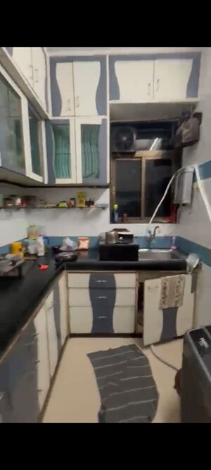 Kitchen in 2 BHK Apartment at Baba Vihar, Kurla – for Rent