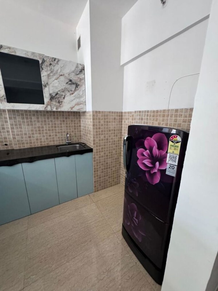 Kitchen, lodha-belmondo 1 Bedroom 490 Sq.Ft. Apartment In Gahunje Pune 10535009