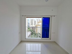 Bedroom in 2 BHK Apartment at Romell Serene, Borivali West – for Sale