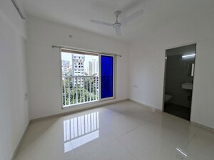 Bedroom in 2 BHK Apartment at Romell Serene, Borivali West – for Sale