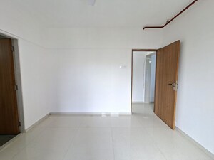 Bedroom in 2 BHK Apartment at Romell Serene, Borivali West – for Sale