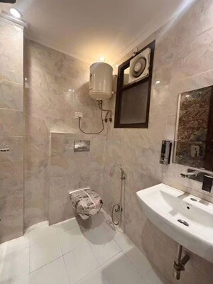 Bathroom in 2 BHK Builder Floor at Chattarpur – for Rent