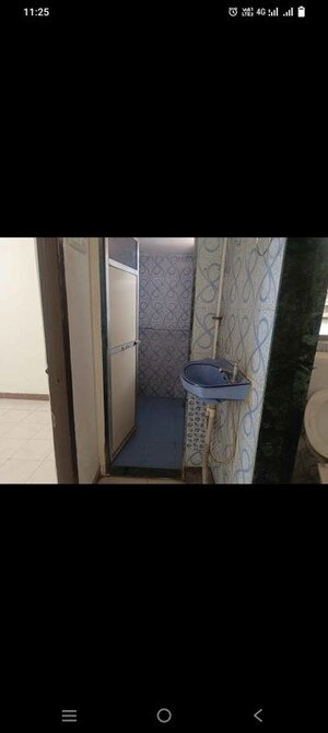 Bathroom in 2 BHK Apartment at Aakash Ganga CHS, Nalasopara West – for Sale