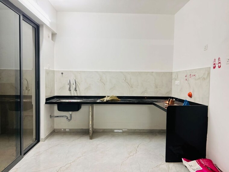 Kitchen, silver-icon-tathawade 1 Bedroom 550 Sq.Ft. Apartment In Tathawade Pune 10535169