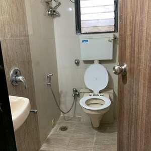 Bathroom in 1 BHK Apartment at Krishna Classic, Babhai Naka – for Rent
