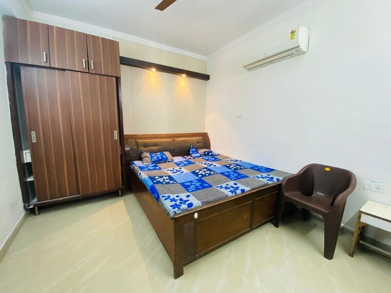 Bedroom, maya-green-lotus-saksham 2 Bedroom 1650 Sq.Ft. Apartment In International Airport Road Zirakpur 10535205