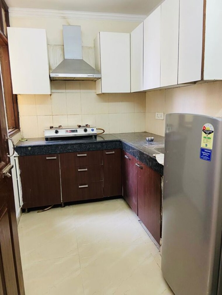 Kitchen, maya-green-lotus-saksham 2 Bedroom 1650 Sq.Ft. Apartment In International Airport Road Zirakpur 10535205