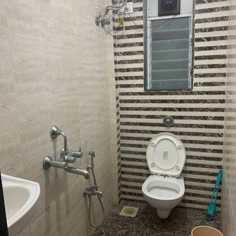 Bathroom, jkd-krishna-koyna 2 Bedroom 650 Sq.Ft. Apartment In Kastur Park Mumbai 10535222