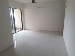 Living Room in 2 BHK Apartment at Runwal Gardens, Dombivli East – for Rent
