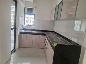 Kitchen in 2 BHK Apartment at Runwal Gardens, Dombivli East – for Rent