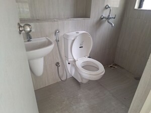 Bathroom in 2 BHK Apartment at Runwal Gardens, Dombivli East – for Rent
