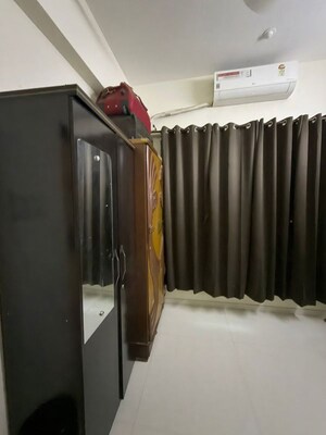 Bedroom in 2 BHK Apartment at Platinum Prive, Andheri West – for Rent