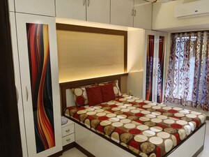 Bedroom in 2 BHK Apartment at Eastern Heights CHS, Mulund East – for Sale