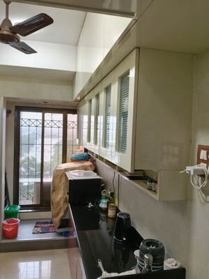 Kitchen in 2 BHK Apartment at Eastern Heights CHS, Mulund East – for Sale