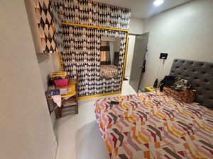 Bedroom in 2 BHK Apartment at MD Madhuban CHS, Dahisar East – for Rent