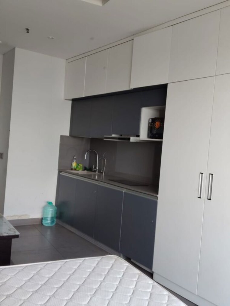 Kitchen, supertech-supernova-astralis Studio 800 Sq.Ft. Apartment In Sector 94 Noida 10535416
