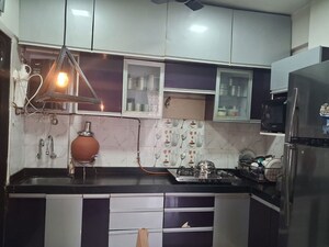 Kitchen in 1 BHK Apartment at Raunak Delight, Owale – for Rent