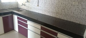 Kitchen in 3 BHK Apartment at Sanjivani Apartment, Prabhat Road – for Rent