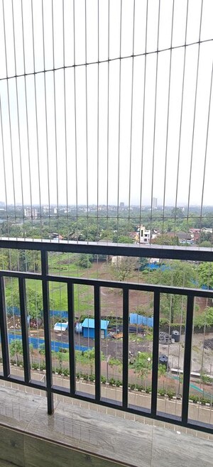 Balcony in 2 BHK Apartment at Runwal Gardens, Dombivli East – for Rent