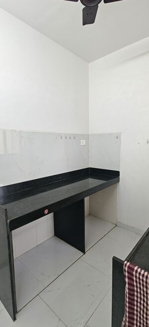 Kitchen in 2 BHK Apartment at Runwal Gardens, Dombivli East – for Rent