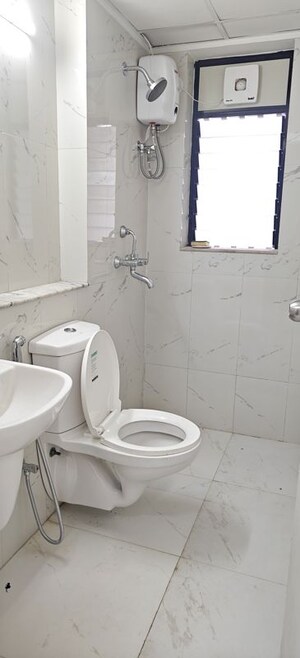Bathroom in 2 BHK Apartment at Runwal Gardens, Dombivli East – for Rent