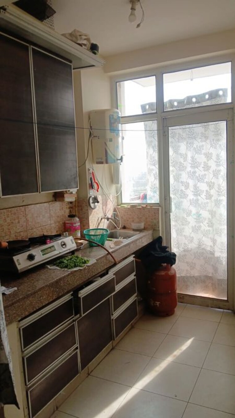 Kitchen, wave-city 2 Bedroom 678 Sq.Ft. Apartment In Wave City Ghaziabad 10535612