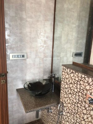 Bathroom in 3 BHK Apartment at Omkar Alta Monte, Malad East – for Rent