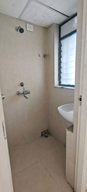Bathroom in 1 BHK Apartment at Runwal Gardens North Avenue, Dombivli East – for Rent