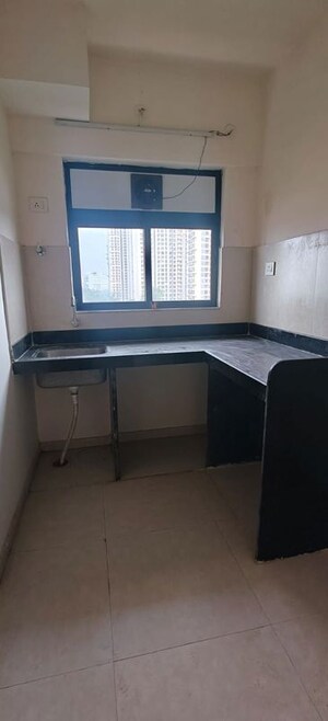 Kitchen in 1 BHK Apartment at Runwal Gardens North Avenue, Dombivli East – for Rent