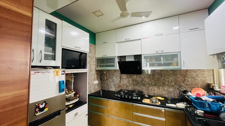 Kitchen, five-star-royal-entrada 2 Bedroom 900 Sq.Ft. Apartment In Wakad Pune 10535849