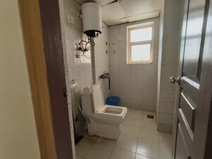 Bathroom in 1 RK Apartment at Logix Blossom Zest, Sector 143 – for Rent