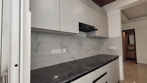 Kitchen in 2 BHK Apartment at Nimbus Express Park View, Chi V Greater Noida – for Rent