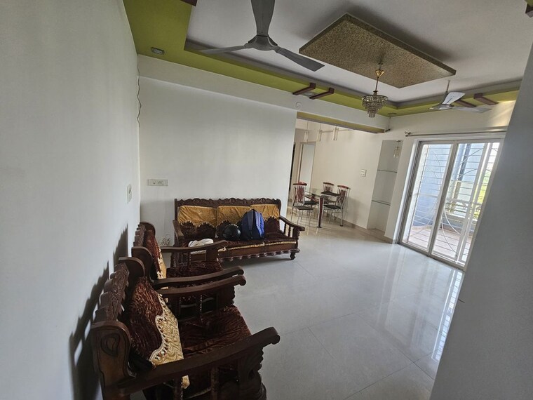 Living Room, sree-mangal-aishwaryam-greens-phase-ii 3 Bedroom 1200 Sq.Ft. Apartment In Wakad Pune 10536104