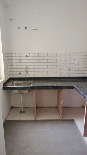 Kitchen in 2 BHK Apartment at Aashish Aamor, Mansarovar – for Sale