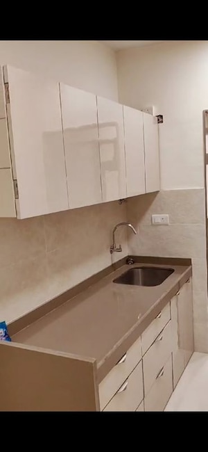 Kitchen in 2.5 BHK Apartment at Lotus Sky Garden, Malad West – for Rent