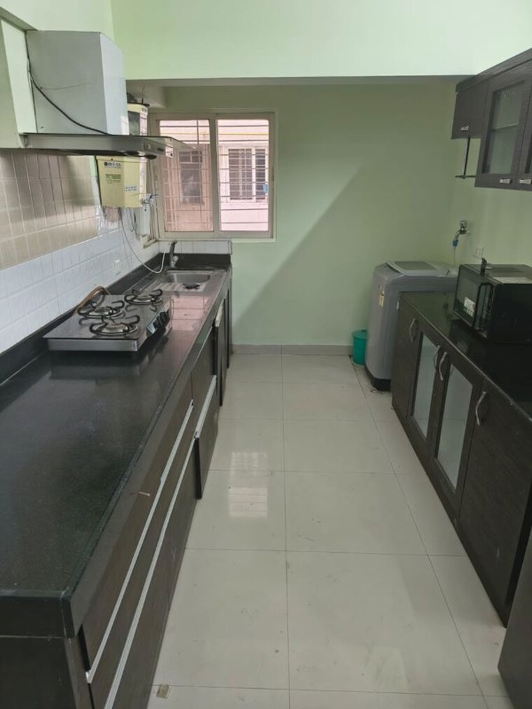 Kitchen, saakshi-parvasaakshi 2 Bedroom 900 Sq.Ft. Apartment In Pimple Saudagar Pune 10536256