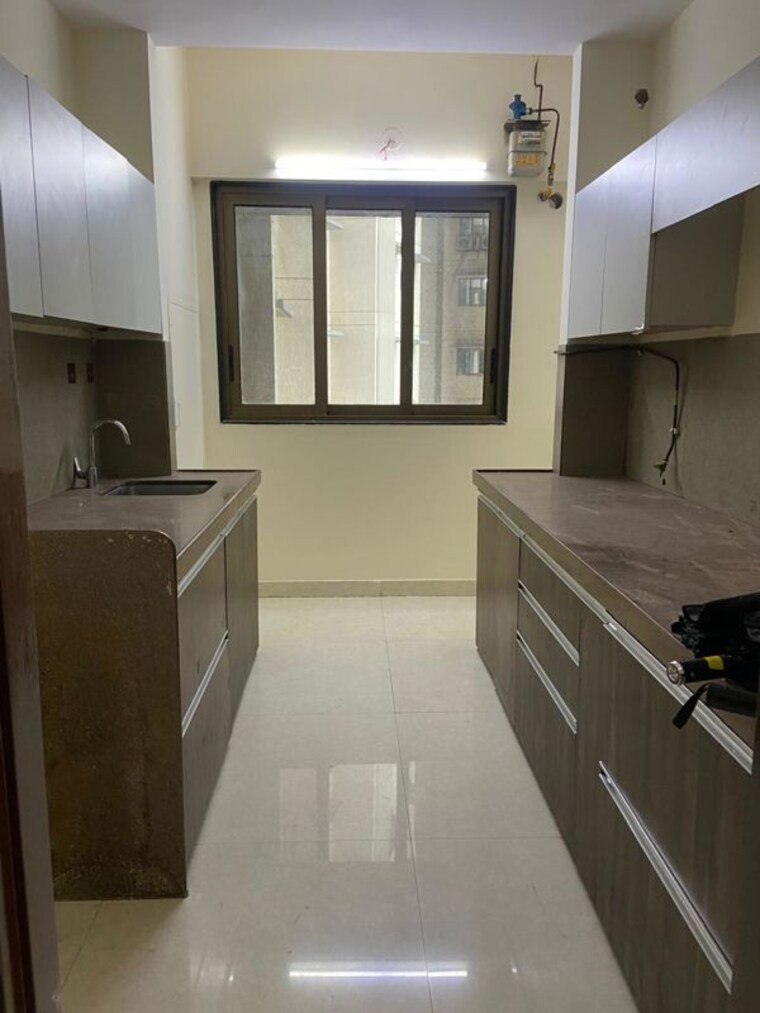 Kitchen, the-wadhwa-atmosphere 2 Bedroom 720 Sq.Ft. Apartment In Mulund West Mumbai 10536324