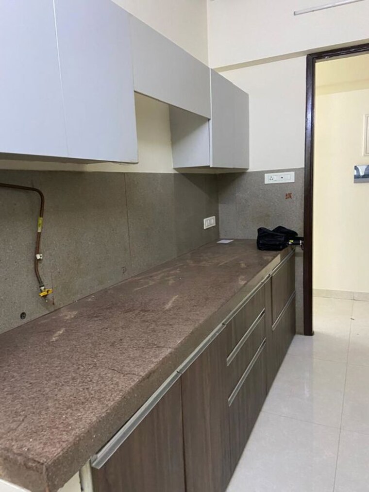 Kitchen, the-wadhwa-atmosphere 2 Bedroom 720 Sq.Ft. Apartment In Mulund West Mumbai 10536324