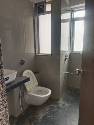 Bathroom in 3 BHK Apartment at Siddhitech Siddhi Yog, Mahim West – for Rent