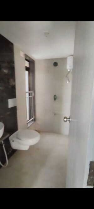 Bathroom in 2 BHK Apartment at Bhutra Anjani Enclave, Mira Road – for Sale