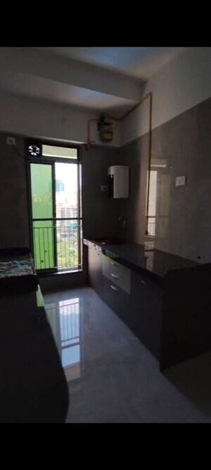 Kitchen in 1 BHK Apartment at Bhutra Anjani Pride, Mira Road – for Sale