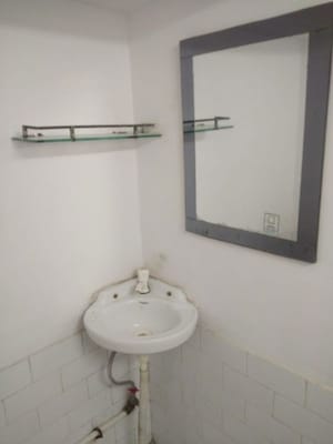 Bathroom in 1 RK Apartment at RWA Apartments Sector 29, Sector 29 – for Rent
