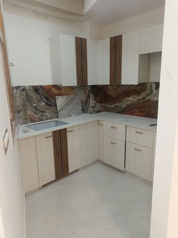Kitchen, trinity-grand 3 Bedroom 1400 Sq.Ft. Builder Floor In Bisrakh Jalalpur Greater Noida 10536413