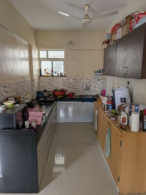 Kitchen in 2 BHK Apartment at Green Groves Apartment, Wagholi – for Rent