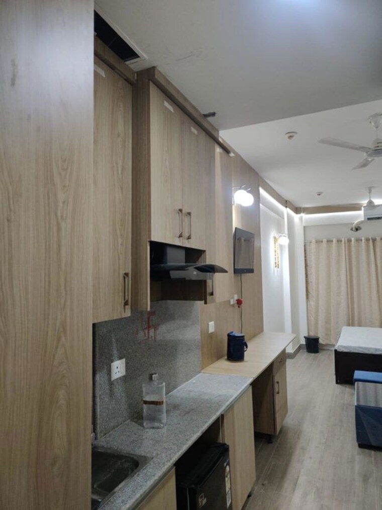 Kitchen, gaur-runway-suites Studio 460 Sq.Ft. Apartment In Gaur Yamuna City Greater Noida 10536440