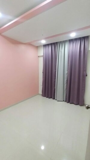 Room in 2 BHK Apartment at Kolte Patil Little Earth, Kiwale – for Sale