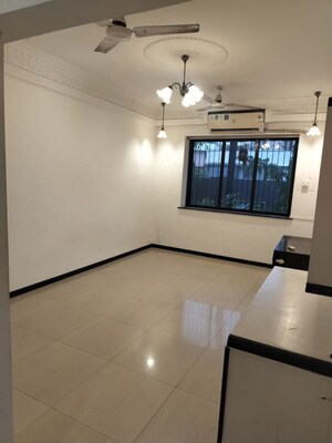Hall in 2 BHK Apartment at Hill Road CHS, Bandra West – for Sale