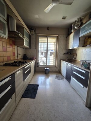 Kitchen in 3 BHK Apartment at Sheth Vasant Lawns, Laxmi Nagar – for Rent