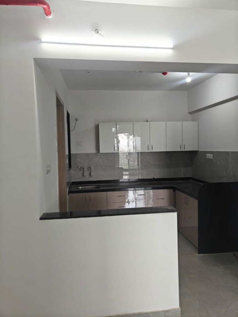 Kitchen, zen-elite 3 Bedroom 1200 Sq.Ft. Apartment In Kharadi Pune 10536568